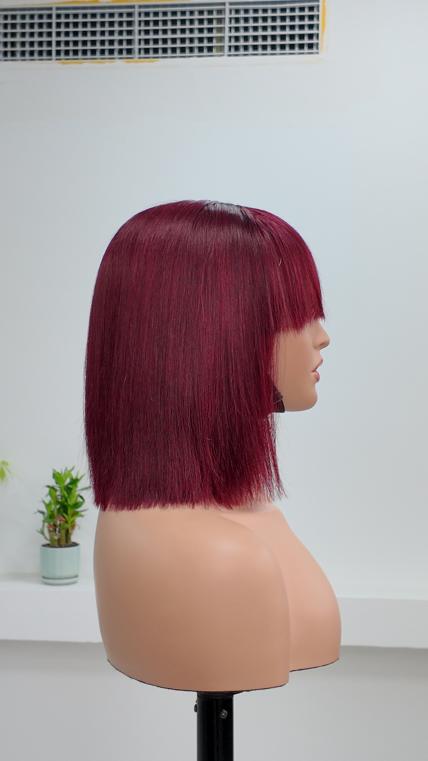 Side view of UNices Hair burgundy red straight bob wig with bangs