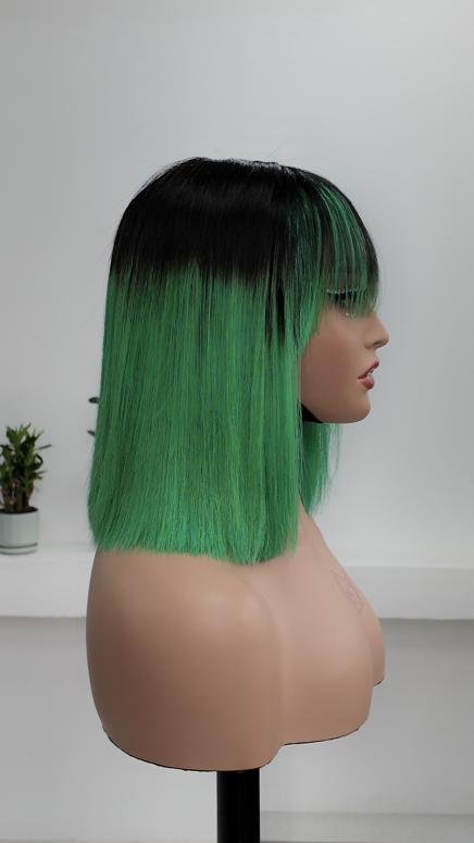 Side view of UNices Hair black root green ombre straight bob wig with bangs