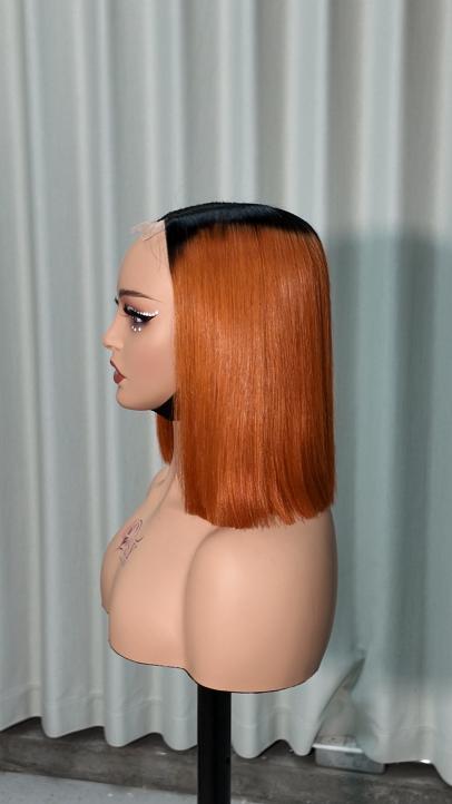Side view of UNices Hair 10 inch dark root ginger orange straight bob wig