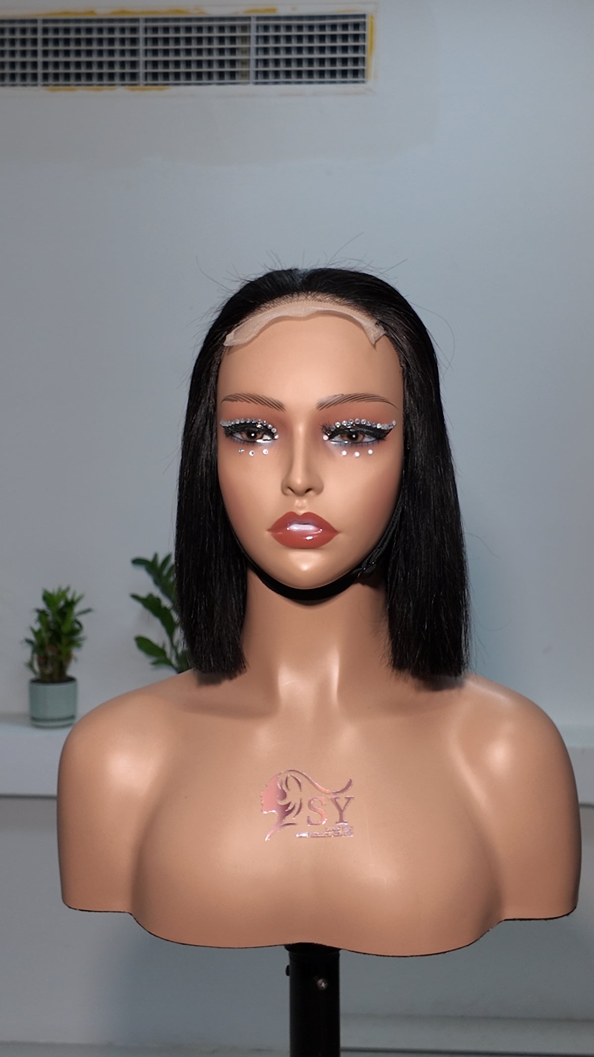 Front view of UNices Hair 10 inch lace front straight bob human hair wig in natural black