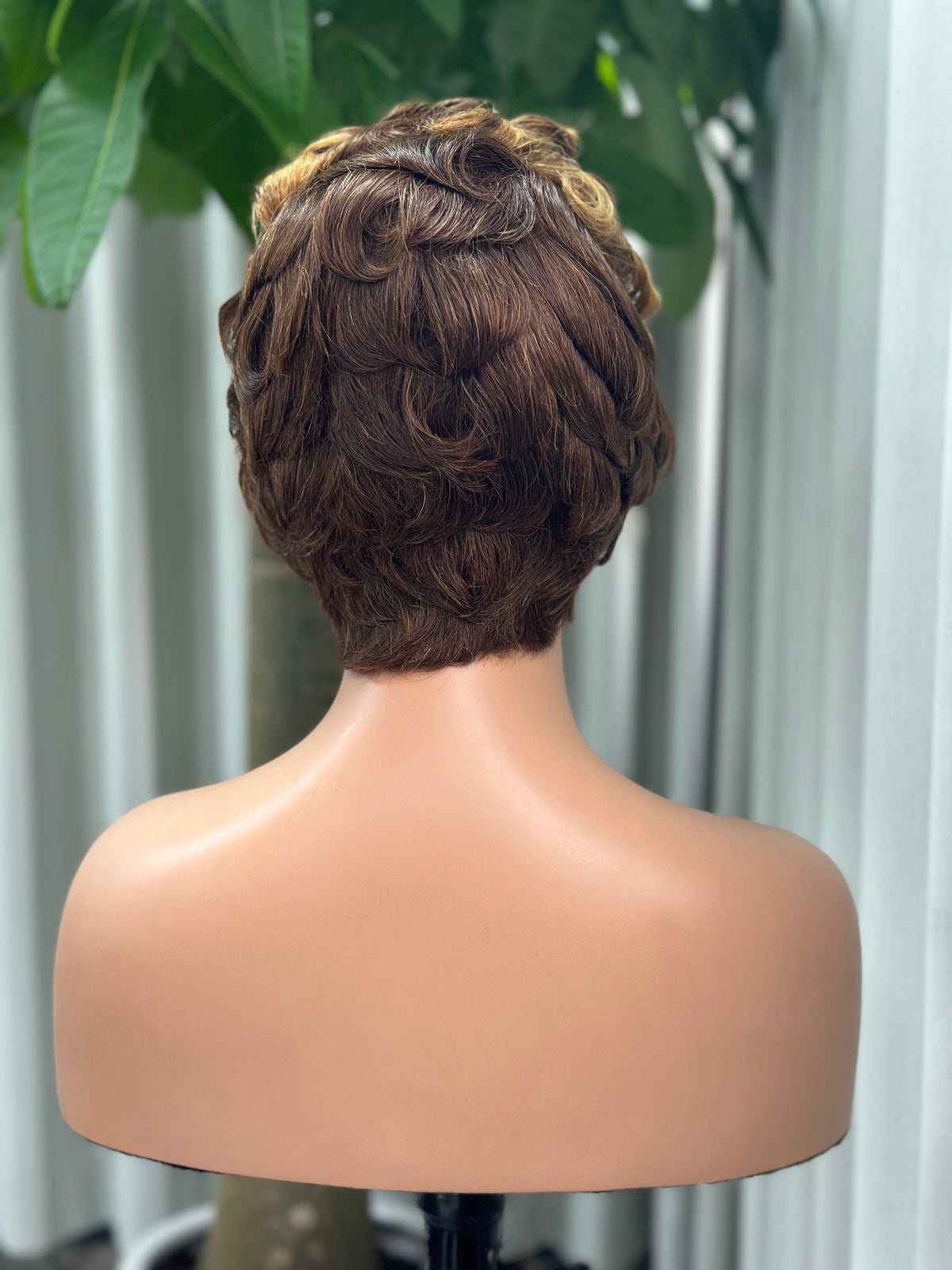 UNices Hair honey brown highlight 13x4 lace modeling curly wig back view