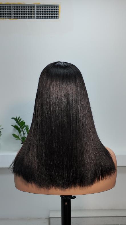 Back view of UNices Hair 14 inch natural black straight human hair wig with bangs