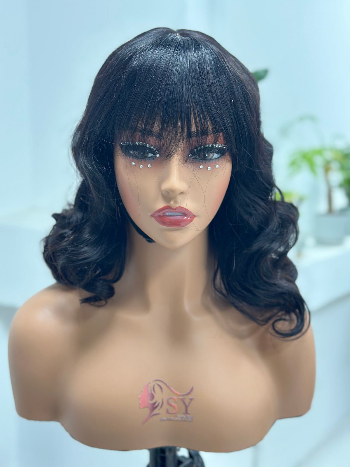 UNices Hair 16 inch loose curl 1x3 lace human hair wig with bangs front view