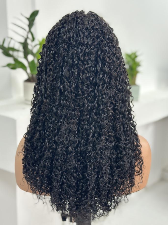 Back view of UNices Hair 22 inch 13x4 HD lace curly human hair wig in natural black