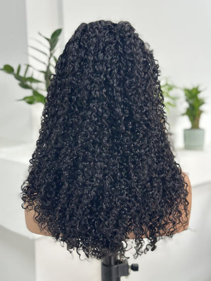 Back view of UNices Hair 22 inch 13x4 HD lace curly human hair wig in natural black