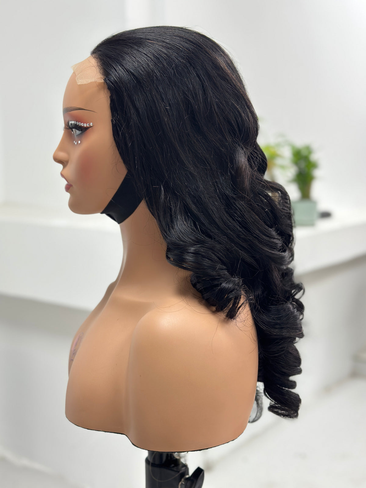 Side view of 22 inch natural black retro curl wig by UNices Hair