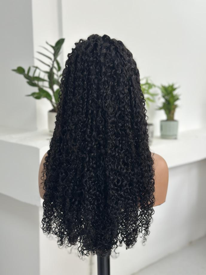Back view of UNices Hair 26 inch 13x4 HD lace curly human hair wig in natural black