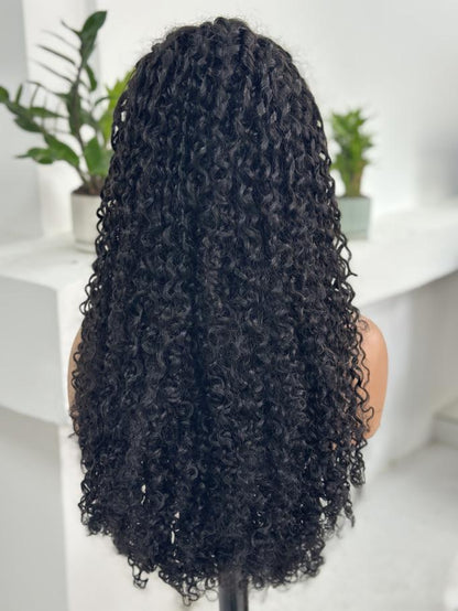 Back view of UNices Hair 28 inch 13x4 HD lace curly human hair wig in natural black