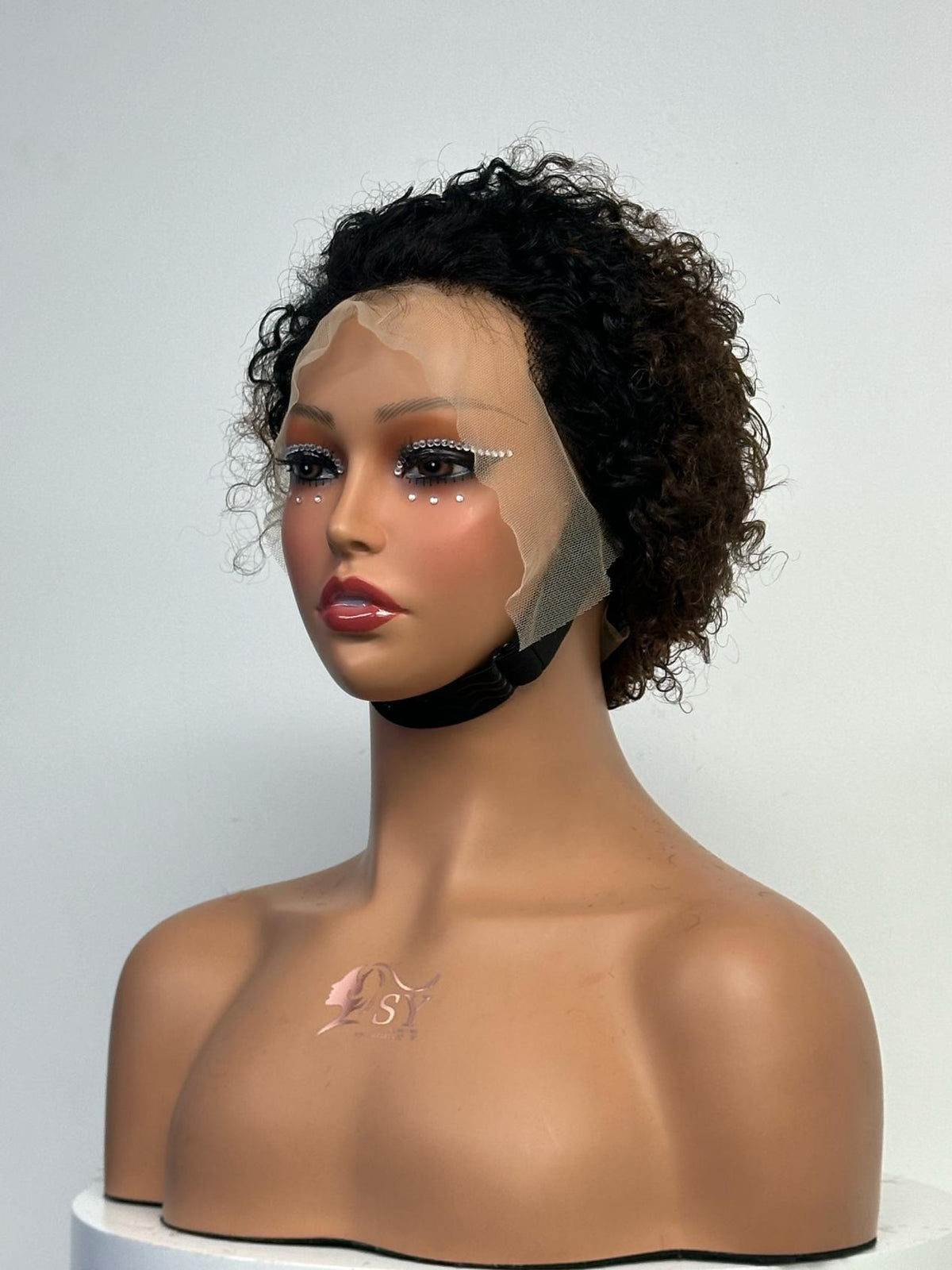 UNices Hair black brown 13x4 lace pixie curly human hair wig front view