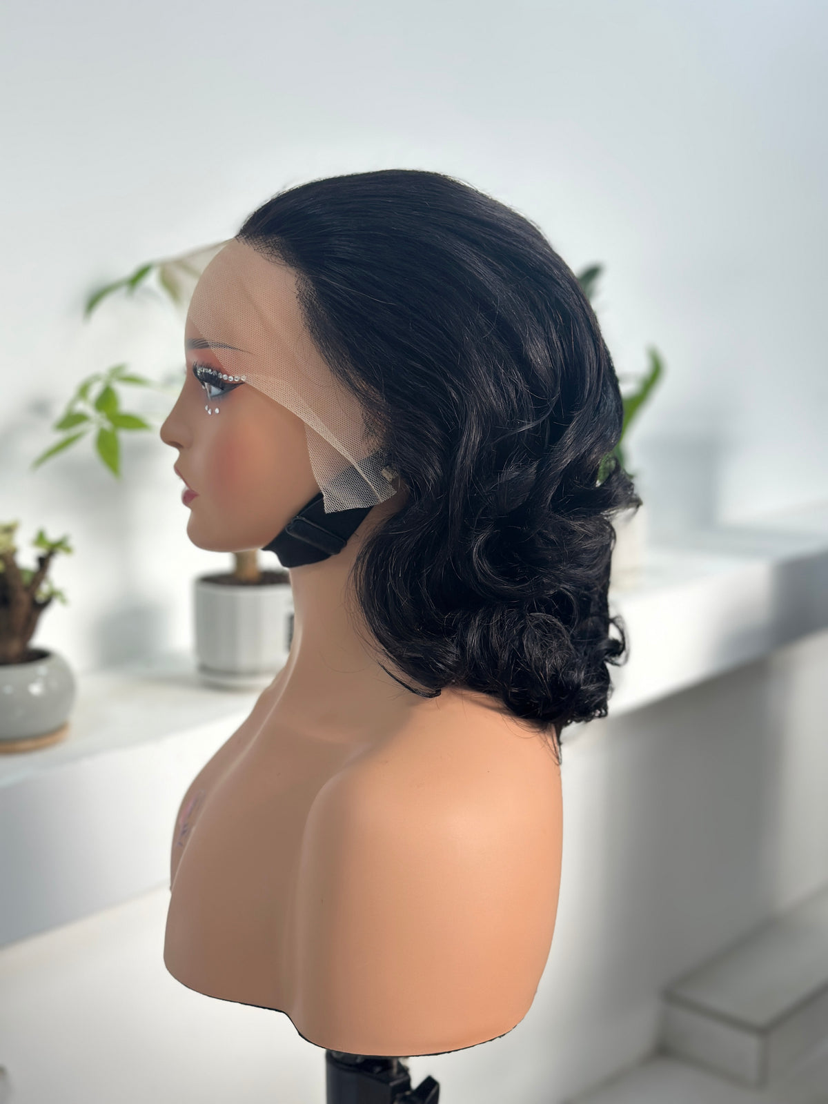 UNices Hair bouncy curly 13x4 lace front human hair wig side view natural black