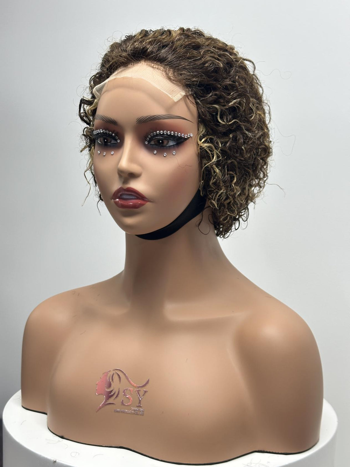 UNices Hair brown with blonde highlights 4x4 lace closure pixie curly human hair wig front view