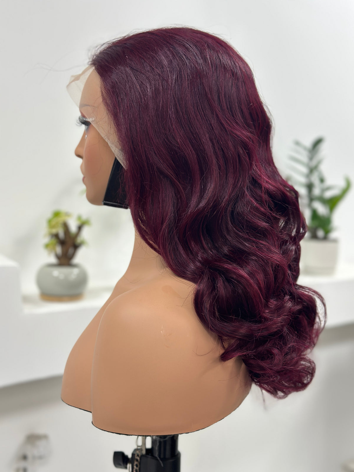 UNices Hair burgundy loose curly 13x4 lace front wig side view