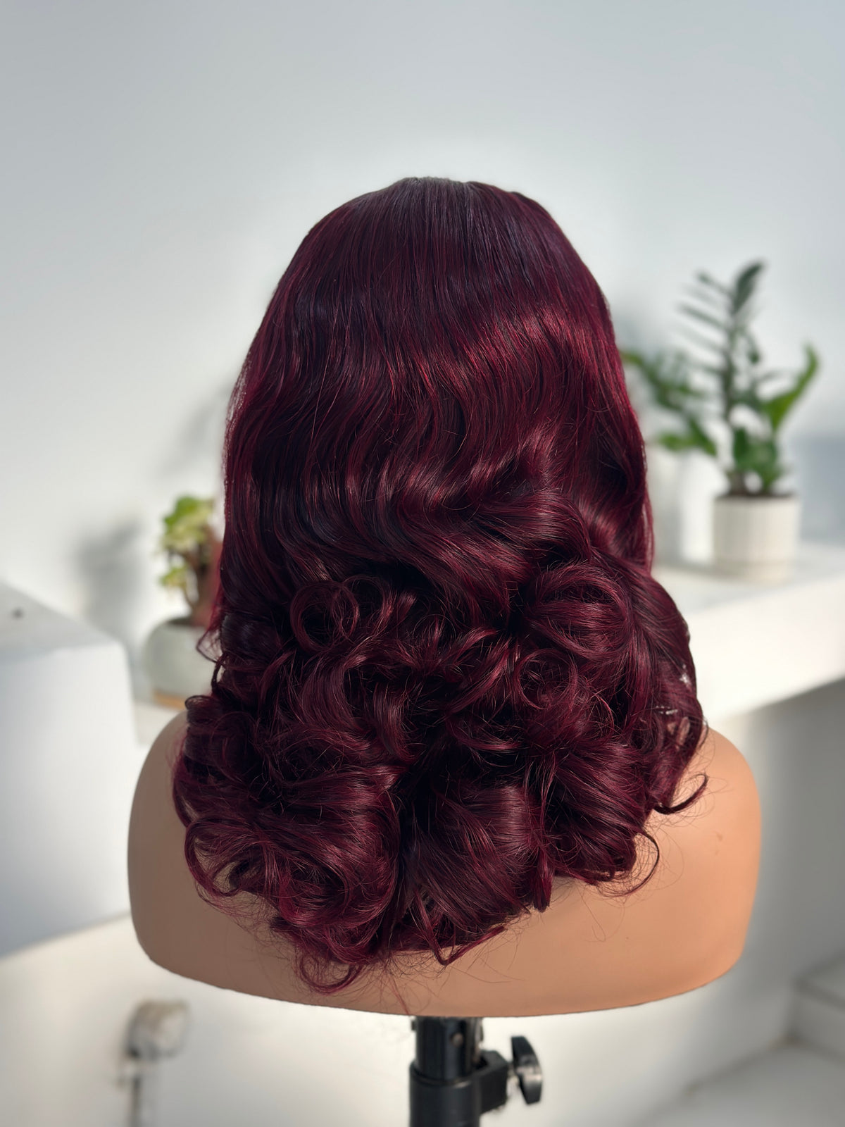 UNices Hair burgundy red bouncy curly human hair wig back view