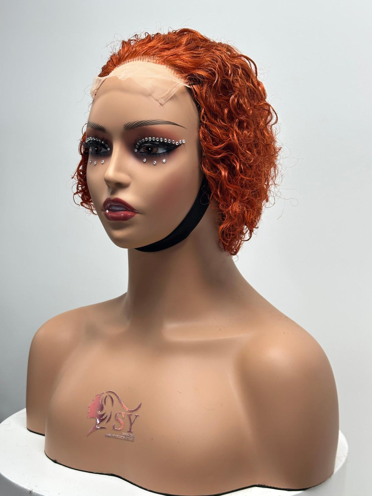 UNices Hair copper orange 4x4 lace closure pixie curly human hair wig front view