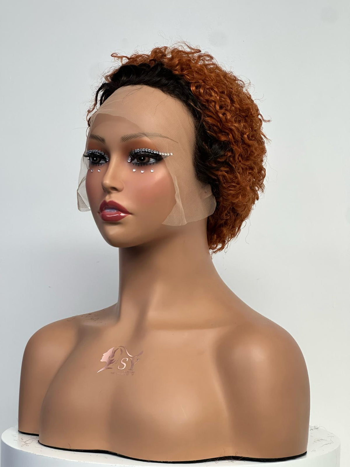 UNices Hair dark root copper orange 13x1 lace pixie curly human hair wig front view
