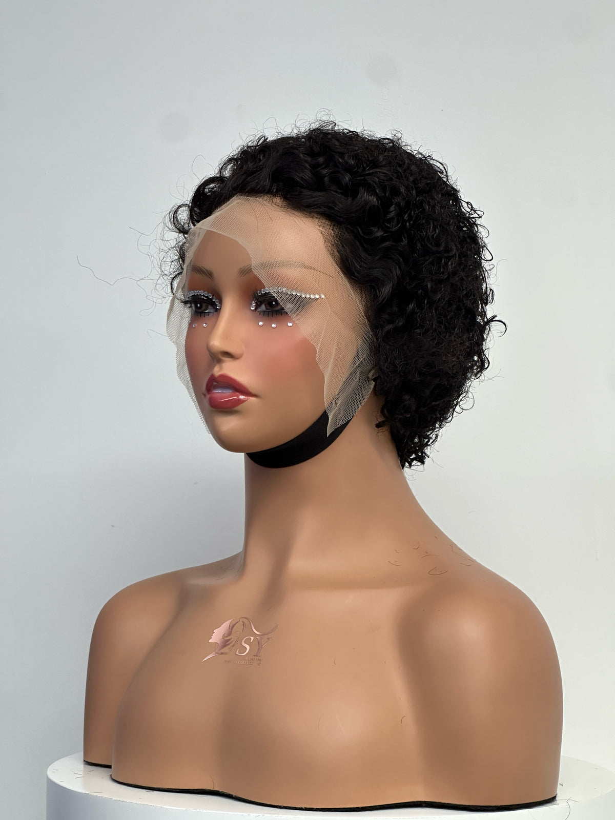 UNices Hair natural black 13x4 lace pixie curly human hair wig front view