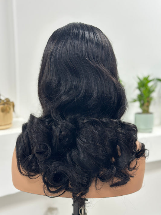 UNices Hair natural black body wave human hair wig back view