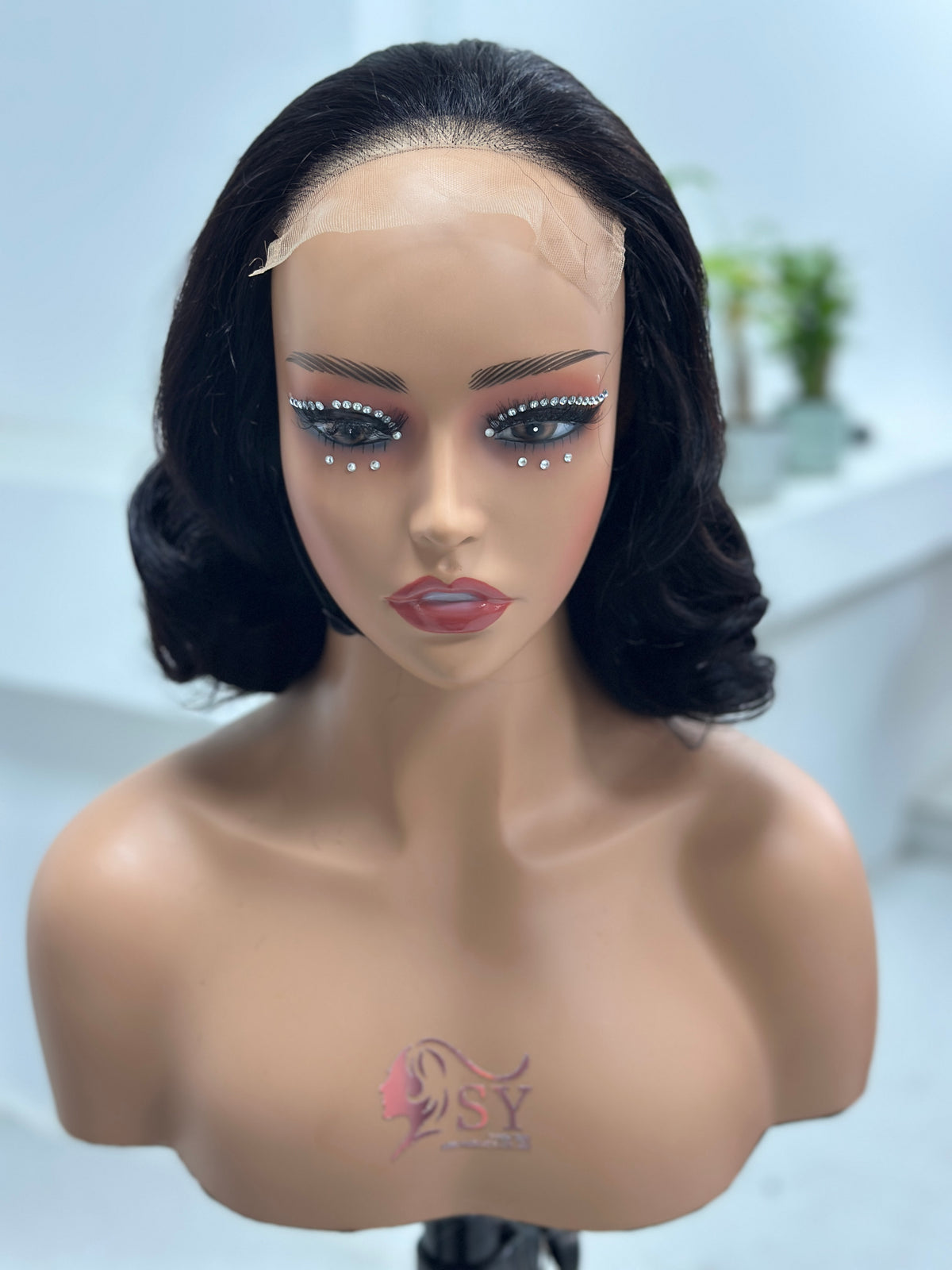 Front view of natural black retro curl human hair wig by UNices Hair